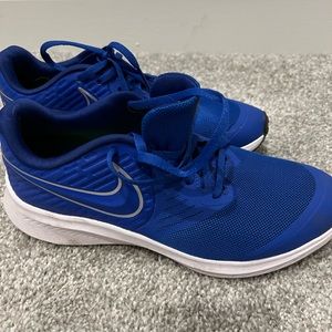 Blue Nike runnners near perfect
